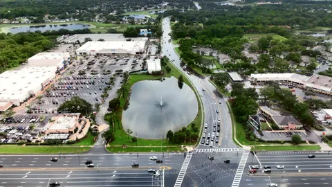Aerial of a busy Central Florida intersection and shopping center near Apopka