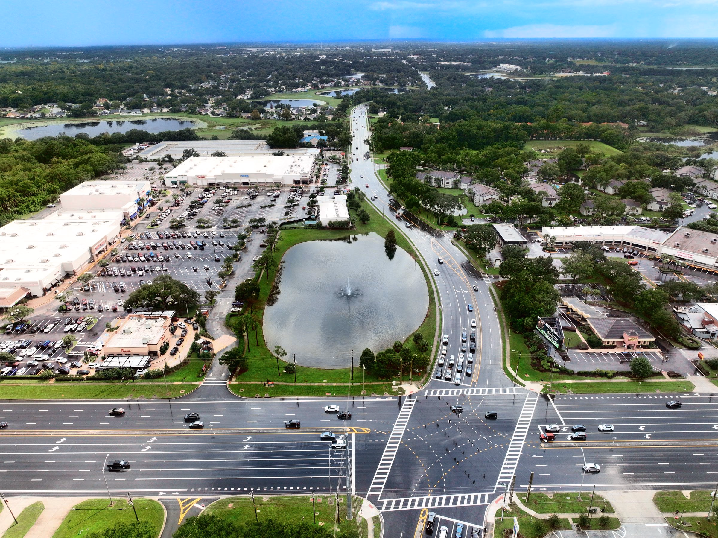 Aerial of a busy Central Florida intersection and shopping center near Apopka