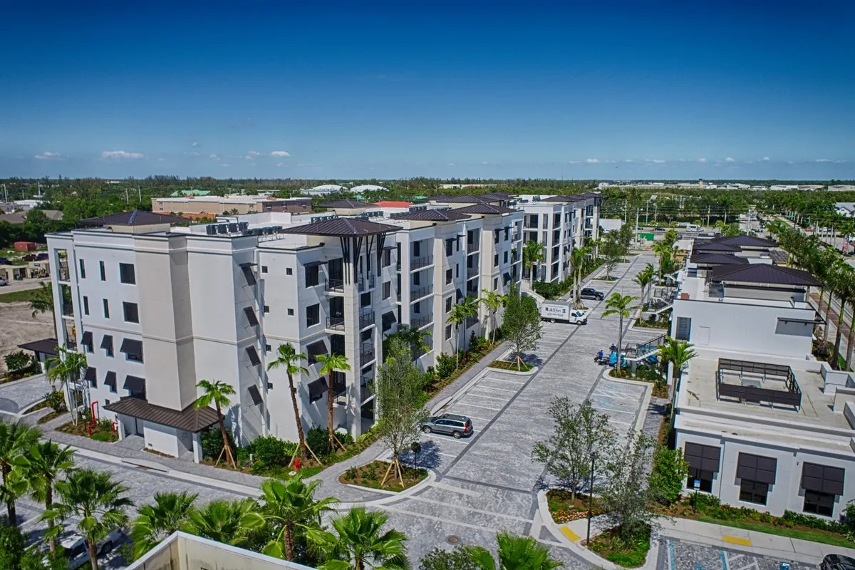 A multi-story Florida residential building photographed from the air, its elevations and balconies in view.