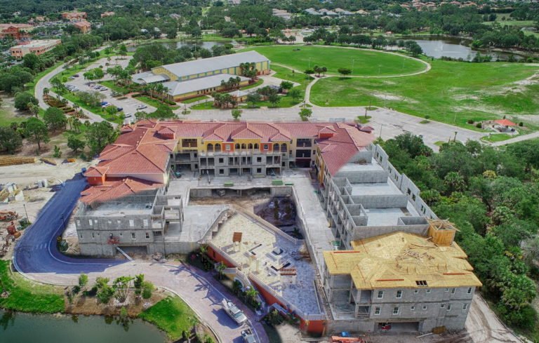 blended photo of progress on condo construction site