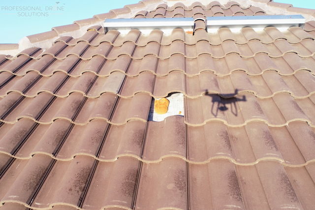 drone roofing inspection showing missing tile