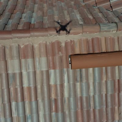 Roofing inspection with a drone drone flies over roofing for inspection