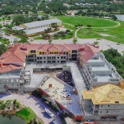 blended photo of progress on condo construction site